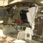 Before and after photographs of a damaged black Volkswagon Jetta that was repaired by Elite Paint & Body Shop in West Palm Beach, Florida.